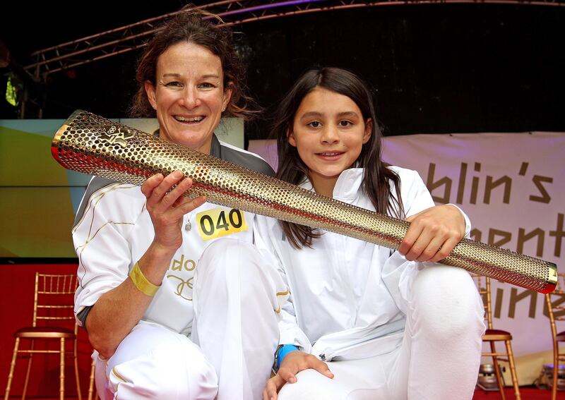 Sonia O'Sullivan with her daughter Sophie and the Olympic torch back in 2012. Photograph: Lorraine O'Sullivan/Inpho