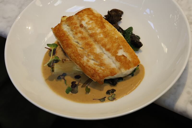 Fillet of turbot, Dauphinoise potatoes, spinach, girolles mushrooms and fish sauce at The Dunmore. Photograph: Nick Bradshaw/The Irish Times