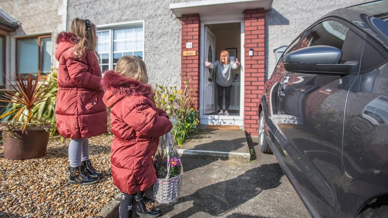 Mother’s Day under coronavirus restrictions sees grandmother Mary Ashe give a virtual hug to her grandchildren Charlie (8) and Billie May (3) Ashe  at her home in Dublin. Photograph: Gary Ashe