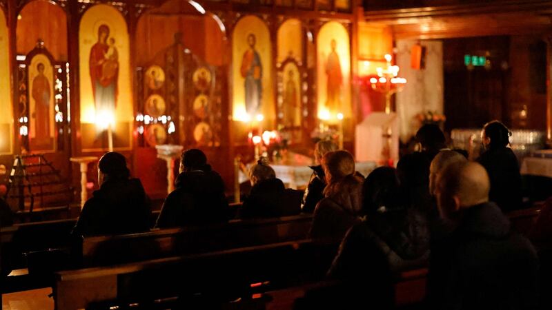 A prayer vigil at the Cathedral of the Holy Family in central London: “Everybody always wants peace, nobody wants war.” Photograph:  Tolga Akmen