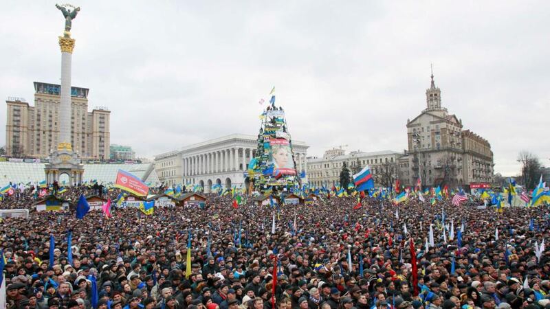 People attend a rally organised by supporters of EU integration. Photograph: Gleb Garanich/Reuters