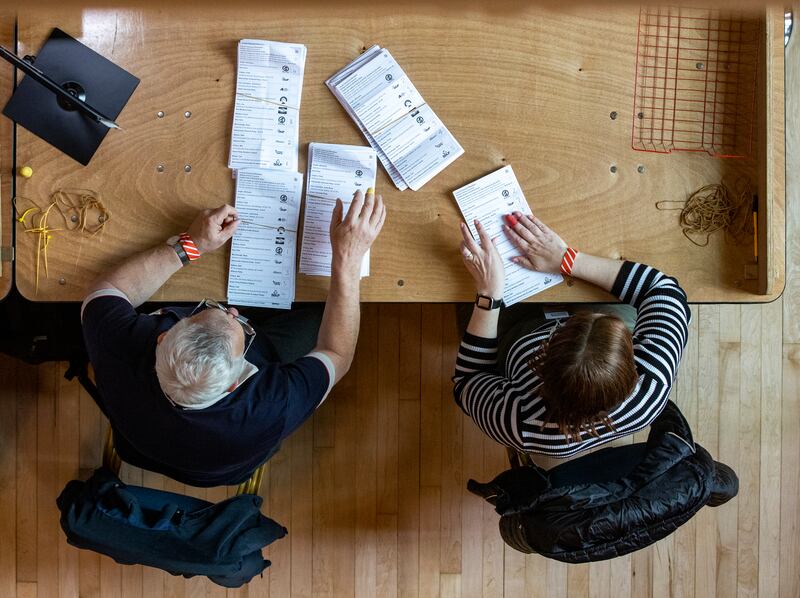 Ballot boxes are opened in Belfast City Hall as counting continues in the Northern Ireland council elections. Photograph: Liam McBurney/PA