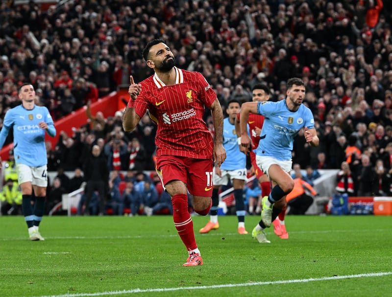 Mo Salah of Liverpool celebrates after scoring the second goal against Manchester City at Anfield. Photograph: John Powell/Liverpool FC via Getty Images