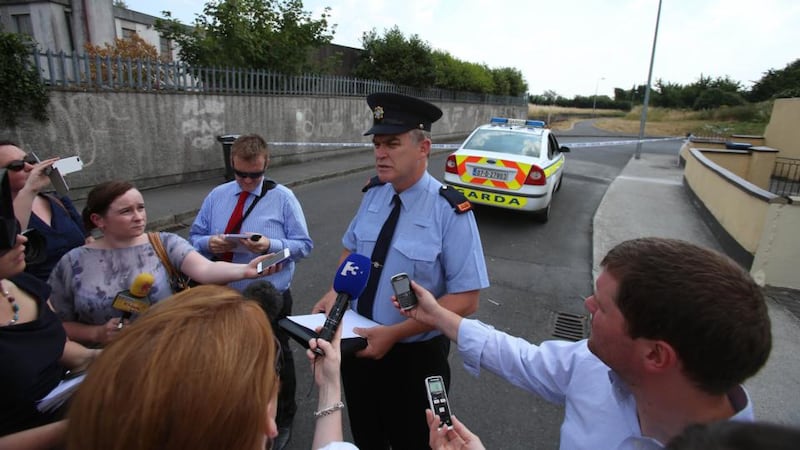 Garda Inspector John Ferris speaks to the media at the scene  today. Photograph: Niall Carson/PA