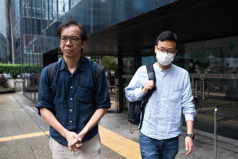 Former Stand News senior editors Chung Pui-kuen (left) and former editor-in-chief Patrick Lam leave the district court in Hong Kong on June 19th last. Photograph: Bertha Wang/EPA