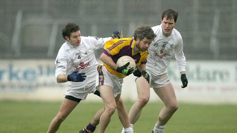 Wexford’s Ciarán Deely (now London manager) in action against Kildare’s Paul Cornish and Mick Foley in 2009. Photograph: Morgan Treacy/Inpho