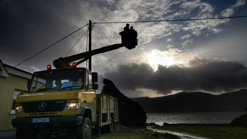 ESB crew restoring power to houses on the Fenit Road near Tralee, Co Kerry.  Photograph: Valerie O’Sullivan