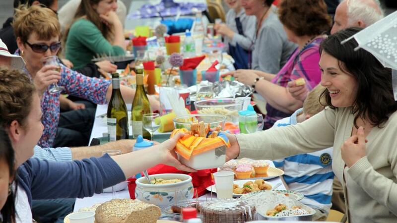 Anita Wester and Molly Walsh sharing food at one of the first Street Feast parties in Donnybrook, Dublin 4, in July 2010. Photograph: Paula Geraghty