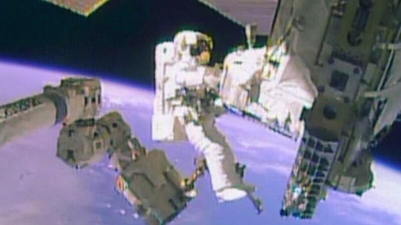 Astronaut Mike Hopkins works outside the International Space Station during his spacewalk yesterday, in this still image taken from video courtesy of Nasa. Two Nasa astronauts floated outside the International Space Station for a second and final spacewalk to fix the outpost’s critical cooling system. Photograph: EPA/Reuters