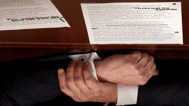 Handwritten notes on the text in front of Donald Trump as he speaks to reporters at the White House on Tuesday. Photograph: Tom Brenner/New York Times