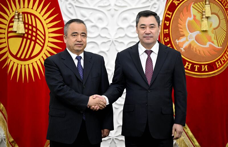 Xinjiang Uyghur Autonomous Region governor Erkin Tuniyaz (left) and Kyrgyzstan's president Sadyr Japarov in Batken, Kyrgyzstan, earlier this year. Photograph: Presidency of Kyrgyzstan/Anadolu/Getty