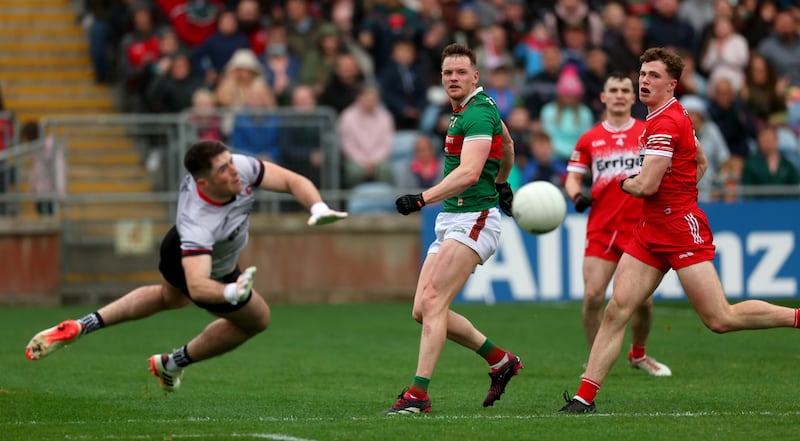 Derry’s goalkeeper Odhrán Lynch saves a goal effort from Matthew Ruane of Mayo. Photograph: James Crombie/Inpho