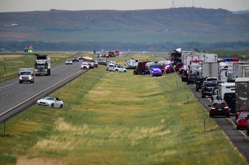 First responders work at the scene. Photograph: The Billings Gazette via AP