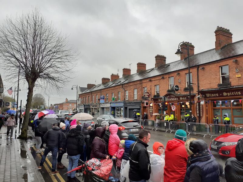 Crowds gather outside the Windsor Bar on Dublin Street, Dundalk. Photograph: Conor Capplis