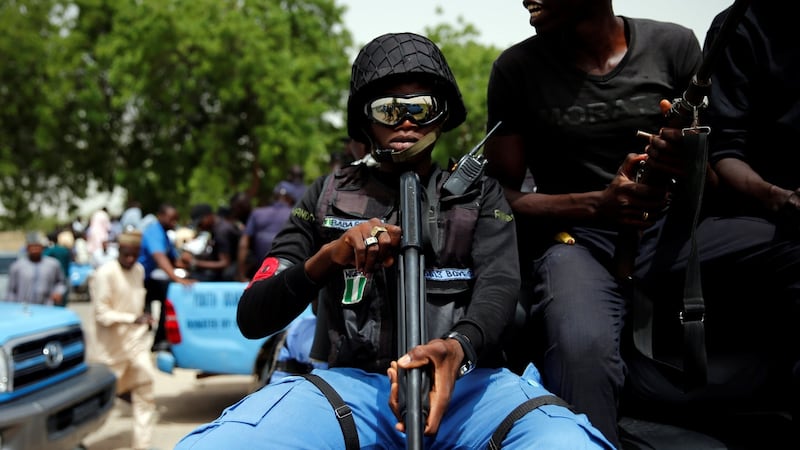 CJTF militia member  Baba Gana holds a gun  in the back of a truck during a patrol in the city of Maiduguri, northern Nigeria, June 9th, 2017. File photograph: Akintunde Akinleye/Reuters