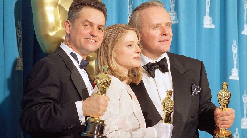 Jonathan Demme holds the Oscar for best director, alongside Jodie Foster (best actress) and Anthony Hopkins (best actor) for The Silence of the Lambs. Photograph: Reed Saxon/AP