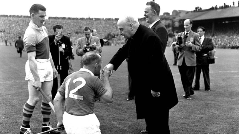 Ring kisses the Archbishop’s ring ahead of the 1954 All-Ireland final against Waterford at Croke Park. Photo: Irish Examiner archive