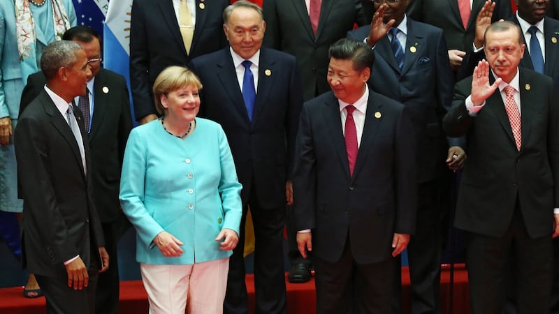 US president Barack Obama, German chancellor Angela Merkel, Kazakh president Nursultan Nazarbayev, Chinese president Xi Jinping and Turkish president Recep Tayyip Erdogan line up for a family photo pose for a family photo during the G20 Summit in Hangzhou, China. Photograph: EPA