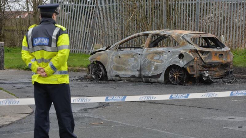 A burnt out car at Glen Vale in Lucan, a short distance from Earlsfort View where Stephen ‘Dougie’ Moran was shot last night and later pronounced dead in hospital. Photograph: Alan Betson / The Irish Times