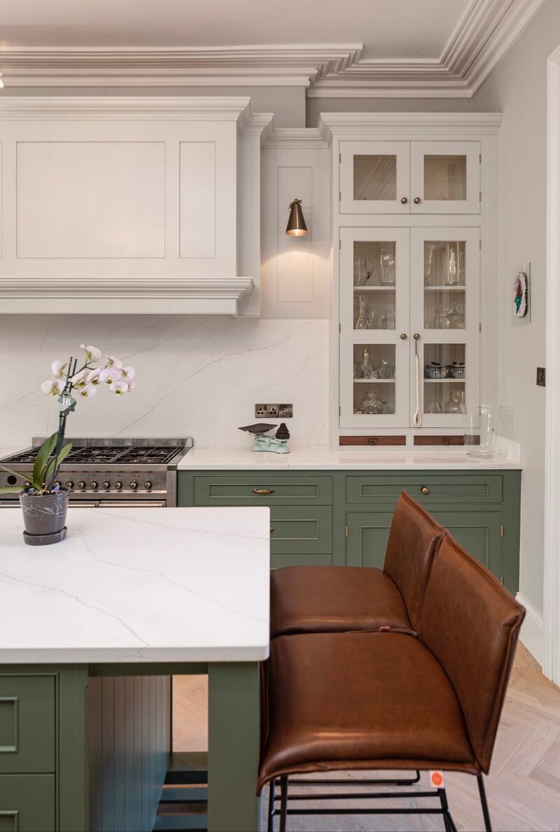 Greys, navy and greens are very popular for kitchens. Pair these with a bright countertop for a lovely contrast