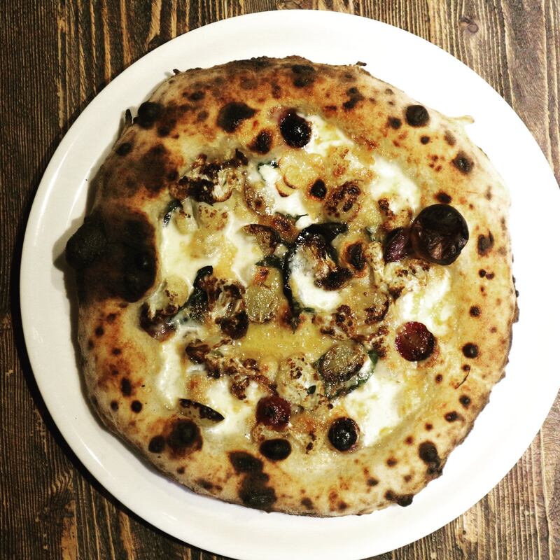 Nutty roast cauliflower, speckled with brown butter, works surprisingly well on the roast cauliflower pizza