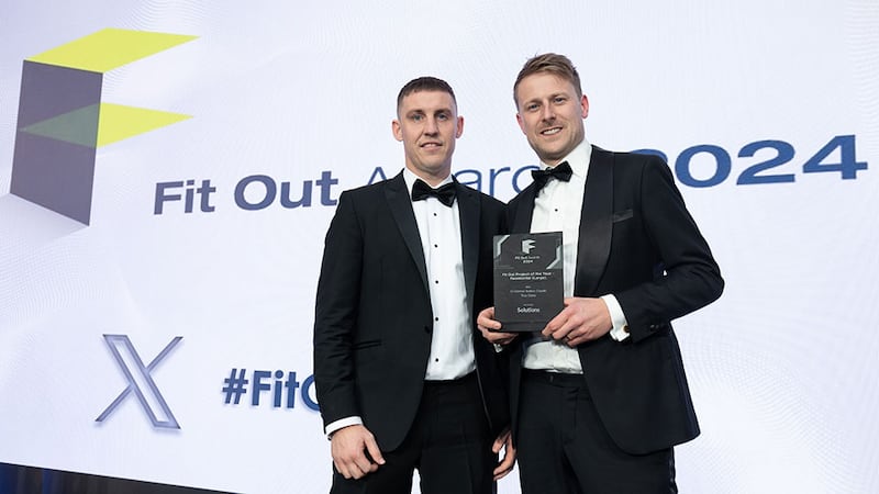 John McDonagh, managing director of solutions, presents the fit out project of the year - residential (large) award to Graham Henry, O'Connor Sutton Cronin