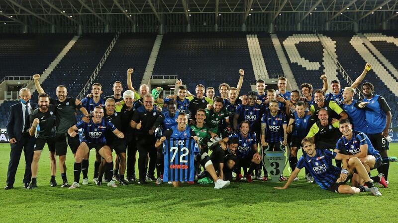 The Atalanta squad celebrate finishing third in Serie A. Photo: Paolo Magni/EPA