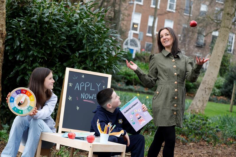 Susan Adams, far right, had the idea for her social enterprise, Education for Sustainability, when she realised her children, Daisy and Jushua, pictured were not learning enough about climate change and the environment at school