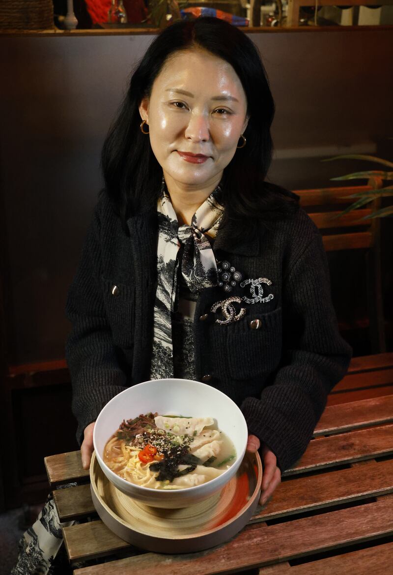 Vivian Cho of Korean Table in Stoneybatter, Dublin, with rice cake dumpling soup. Photograph: Nick Bradshaw