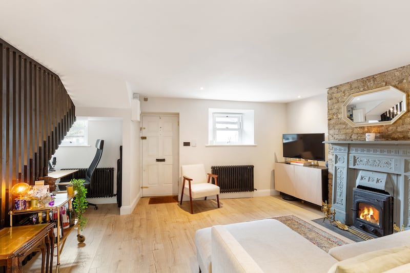 Livingroom and understairs office. Photograph: Viv van der Holst