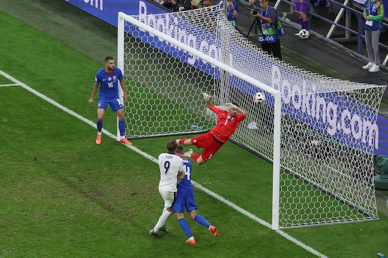 Harry Kane of England scores his team's second goal past Martin Dubravka of Slovakia. Photograph: Dean Mouhtaropoulos/Getty