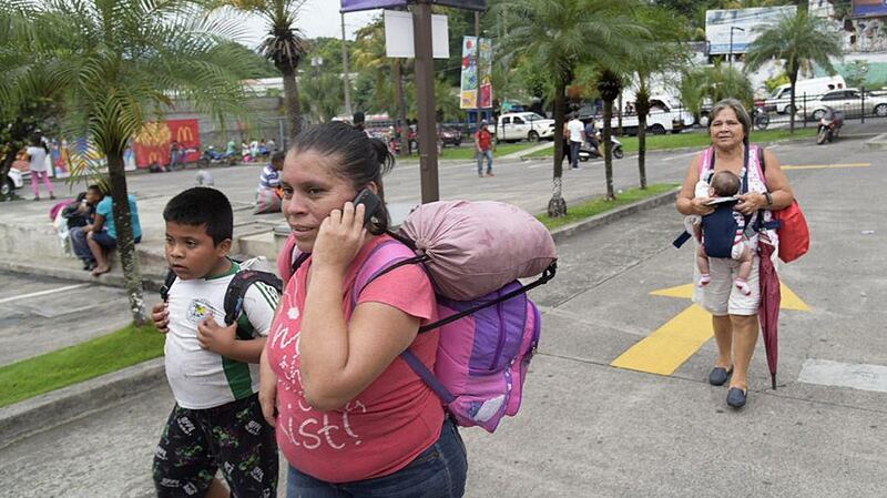 Inhabitants evacuate on orders of authorities in the village of El Rodeo, Guatemala. The village was one of the most affected after the eruption of Fuego volcano on Sunday. Photograph: Rodrigo Pardo/EPA