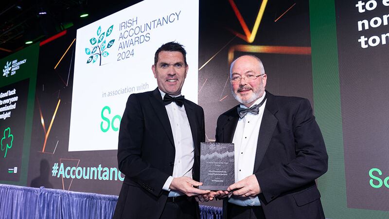 Garry Holligan, head of sales, Financefair, presents the finance team of the year – large award to Seamus Kilbane, West Pharmaceuticals – Global Finance Services