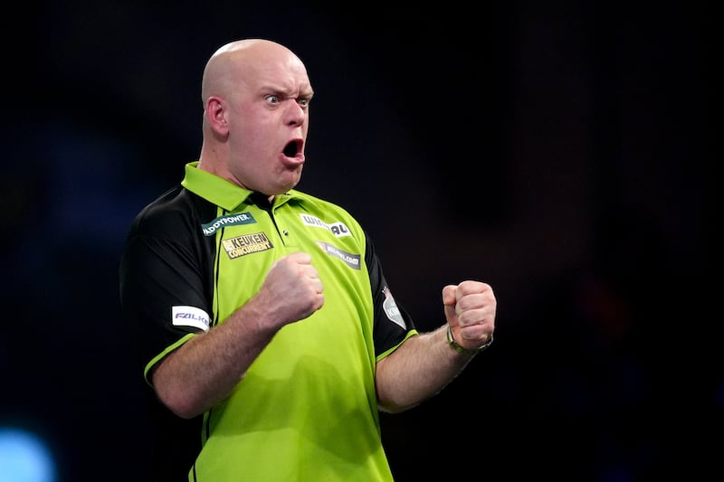 Michael van Gerwen celebrates his victory over Jeffrey de Graaf. Photograph: John Walton/PA Wire