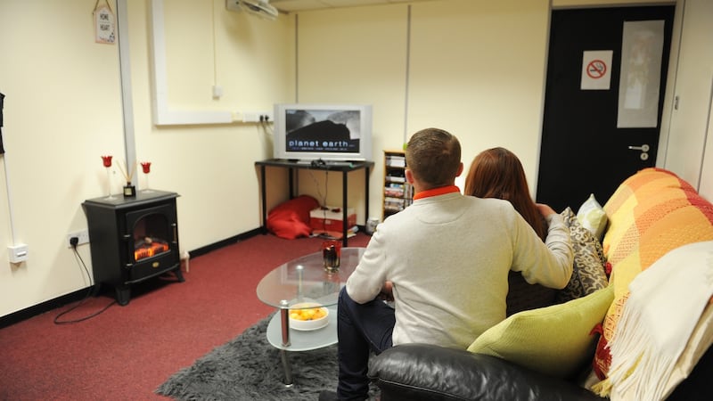 Residents pictured in their bedroom in Apollo House, Dublin. All furniture has been removed from the building which was occupied by housing activists recently. Photograph: Aidan Crawley.