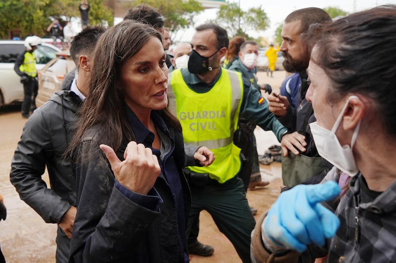 Queen Letizia of Spain talks with a person as angry residents heckled during the Spanish royal couple's visit to Paiporta, in the region of Valencia, eastern Spain, on November 3rd, 2024, in the aftermath of devastating deadly floods. Photograph: Getty Images