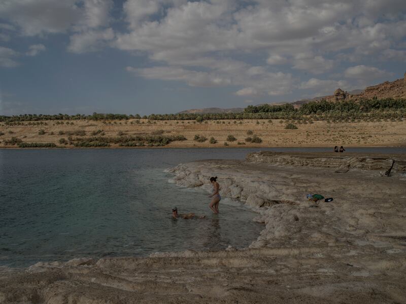 Tourists swim at the Dead Sea in Jordan. Photograph: Laura Boushnak/The New York Times