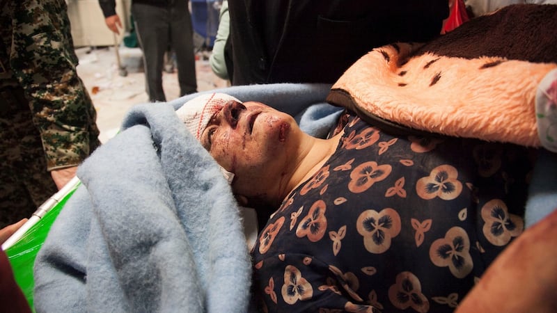 A victim receives treatment at a hospital following a 7.3-magnitude earthquake in Sarpol-e Zahab in Iran’s western province of Kermanshah. Photograph:  Farzad Menati/AFP/Getty Images