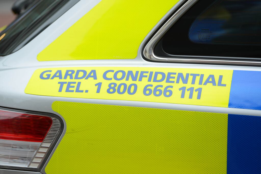 16/08/2012...STOCK...WEEKEND...ARCHIVE...
Garda confidential line advertised on squad car.
Photograph: Frank Miller  /	THE IRISH TIMES
16/08/2012...STOCK...WEEKEND...ARCHIVE...
Photograph: Frank Miller  /	THE IRISH TIMES

keywords - garda gardai crest brand garda car garda van