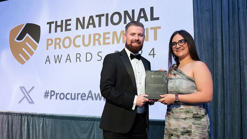 Edward Fagan, awards judge, presents the best procurement collaboration project of the year - large to Josephine Bonanno, Primark