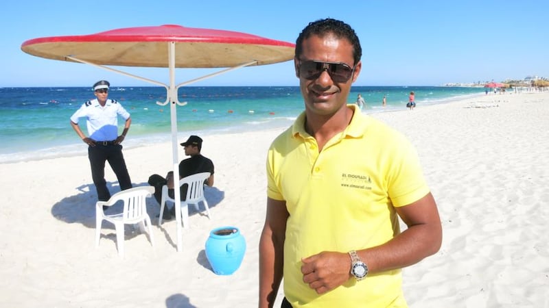 Mohammed Dabbou, a beach craft manager, on the now heavily patrolled Sousse beach in Tunisia. “I don’t think about dying – that came later,” said Dabbou, of the massacre by Seifeddine Rezgui. “I was only thinking I want to kill him.” Photograph: Chris Stephen