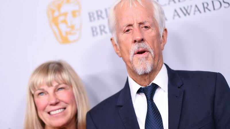 Michael Apted and his wife Paige Simpson arrive for the 2019 BAFTAs. Photograph: Valerie Macon/AFP