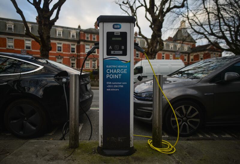 Electric cars charging in Dublin city center. Photograph: Artur Widak/NurPhoto via Getty Images