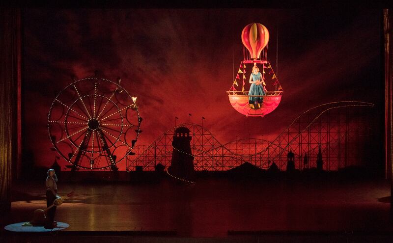 Così Fan Tutte: a Metropolitan Opera production set in a 1950s carnival fairground inspired by Coney Island in New York. Photograph: Jonathan Tichler/Metropolitan Opera