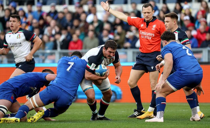 Italy’s Michele Lamaro with Charles Ollivon of France during the Six Nationas clash at the Stadio Olimpico, Rome, where France got away lightly for persistent offending as they ran up a whopping total of 18 penalties. Photograph: Giuseppe Fama/Inpho 