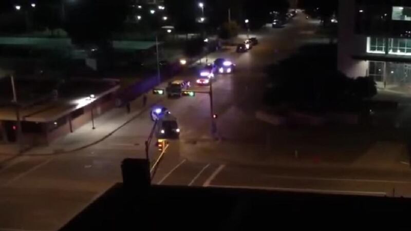 Video still showing  standoff between police and suspects. Photograph: YouTube.com/Screenshot