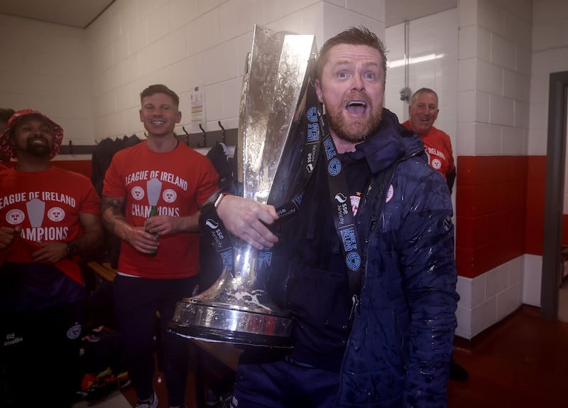 Shelbourne manager Damien Duff celebrates with the SSE Airtricity League Premier Division trophy. Photograph: Ben Brady/Inpho