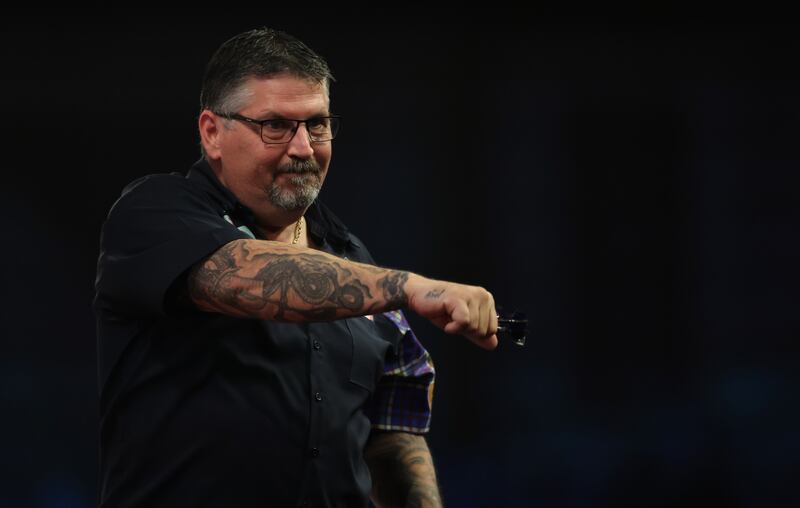 Gary Anderson of Scotland celebrates the win over Madars Razma of Latvia. Photograph: Luke Walker/Getty