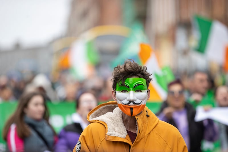 A person at a demonstration calling for stricter immigration controls in Dublin in February 2023. Photograph: Tom Honan for The Irish Times.