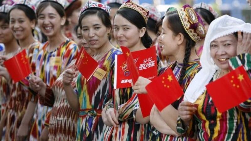 Women in traditional Uighur clothes in Kashgar, Xinjiang province. File photograph: Reinhard Krause/Reuters